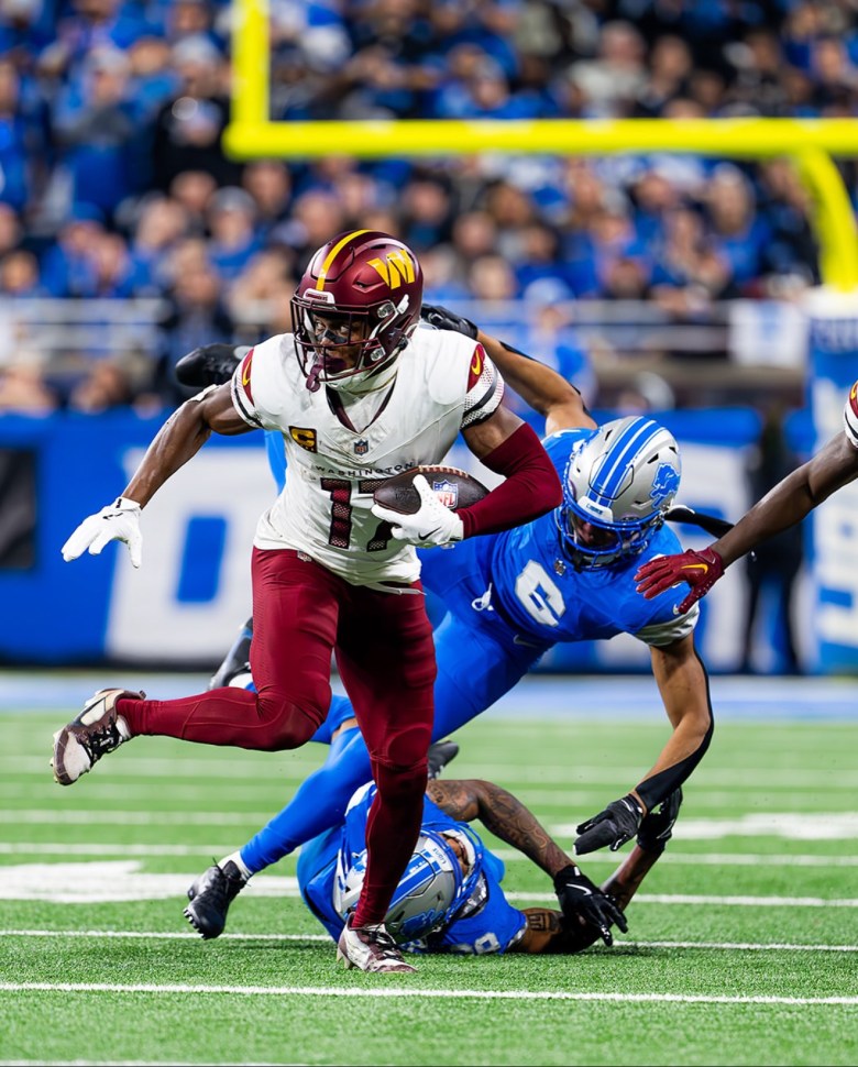 Commanders wide receiver Terry McLaurin evades defenders in the 45-31 win over the Detroit Lions in the NFC divisional playoff game on Jan. 18, 2025. (Abdullah Konte/The Washington Informer)