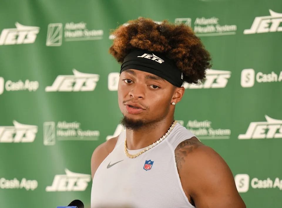 Jul 23, 2025; Florham Park, NY, USA; New York Jets quarterback Justin Fields (7) speaks at a press conference during training camp at Atlantic Health Jets Training Center.John Jones-Imagn Images