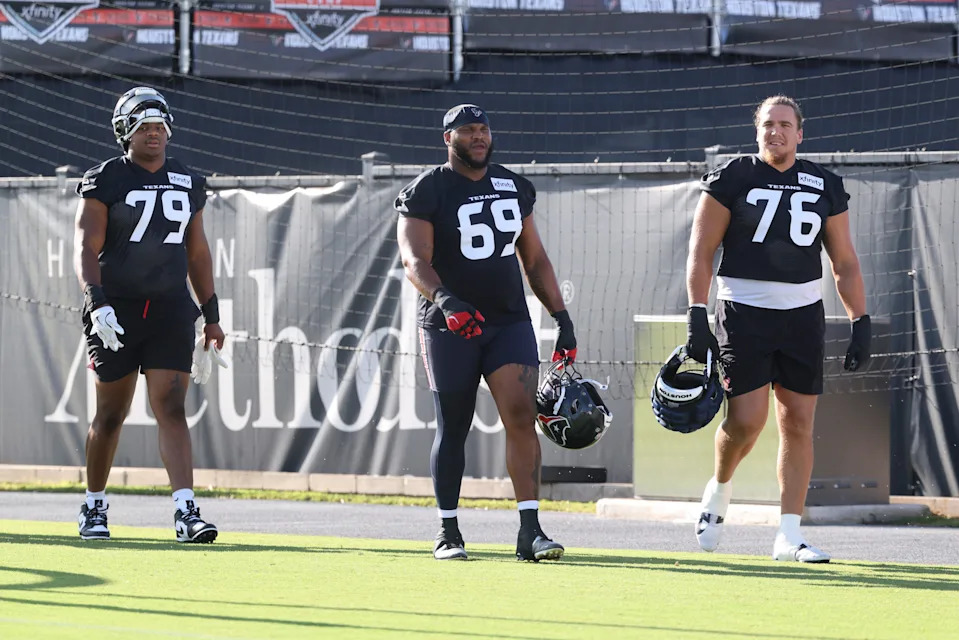 Jul 23, 2025; Houston, TX, USA; Houston Texans offensive tackle Aireontae Ersery (79) and guard Ed Ingram (69) and tackle Austin Deculus (76) during training camp at Houston Methodist Training Center. Mandatory Credit: Troy Taormina-Imagn Images