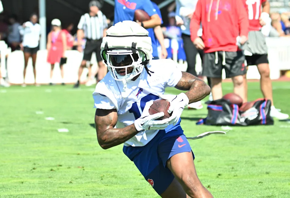 Jul 23, 2025; Rochester, NY, USA; Buffalo Bills wide receiver Elijah Moore (18) turns up field after catching a pass during training camp at St. John Fisher University. Mandatory Credit: Mark Konezny-Imagn Images