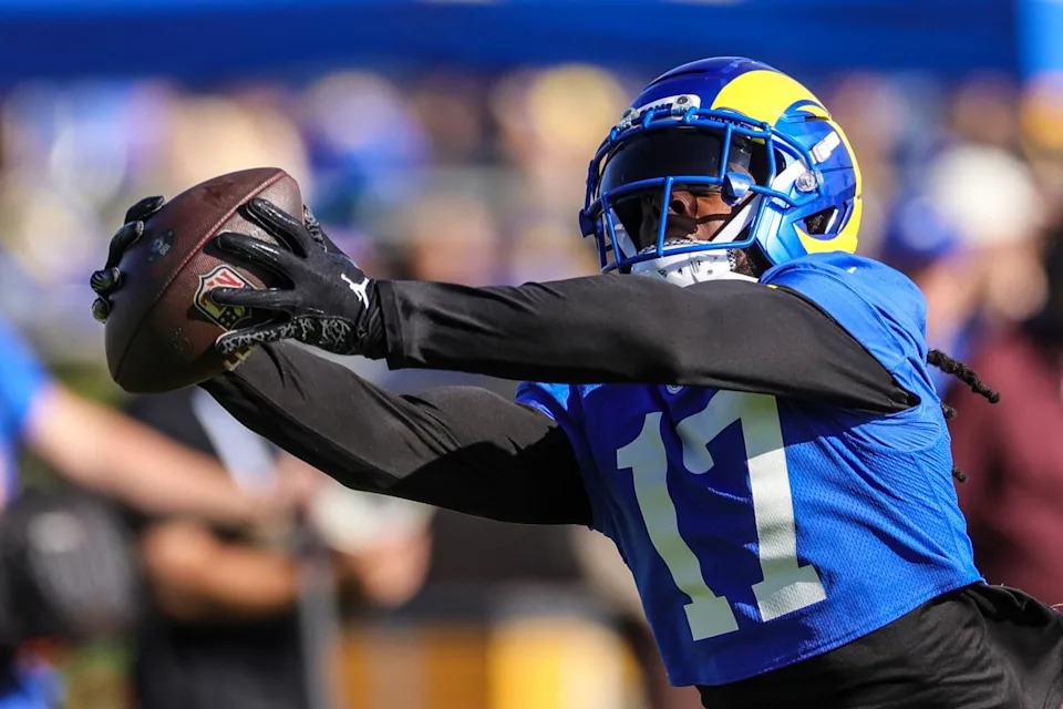 Rams wide receiver Davante Adams catches a pass during training camp.