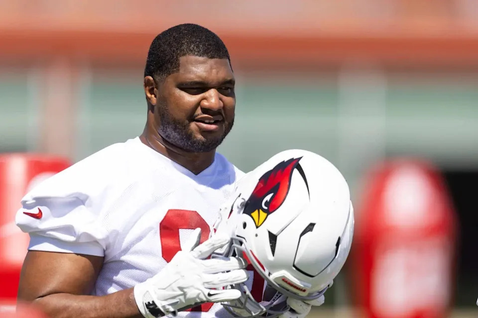 Jun 10, 2025; Tempe, AZ, USA; Arizona Cardinals defensive lineman Calais Campbell (93) holds his helmet during minicamp at the teams Arizona Cardinals Training Facility. Mandatory Credit: Mark J. Rebilas-Imagn Images