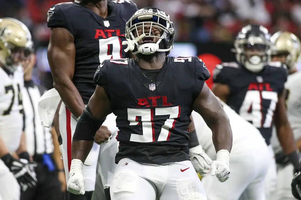 Sep 11, 2022; Atlanta, Georgia, USA; Atlanta Falcons defensive end Grady Jarrett (97) celebrates after a sack against the New Orleans Saints in the second quarter at Mercedes-Benz Stadium. Mandatory Credit: Brett Davis-USA TODAY Sports