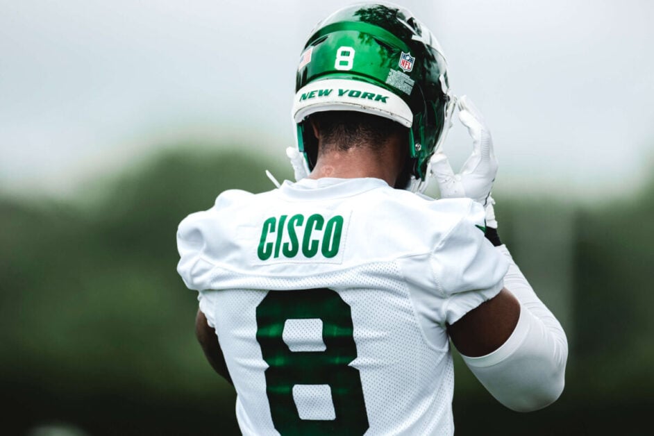 Andre Cisco wearing his New York Jets jersey
