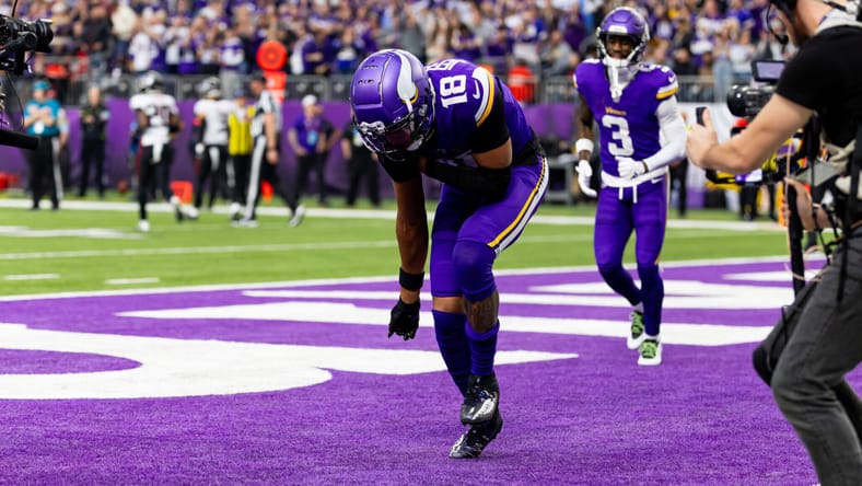 Justin Jefferson celebrates after scoring a touchdown - Minnesota Vikings