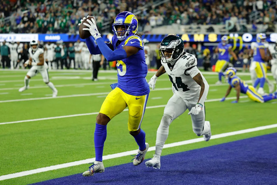 INGLEWOOD, CALIFORNIA - NOVEMBER 24: Demarcus Robinson #15 of the Los Angeles Rams catches a touchdown pass against Isaiah Rodgers #34 of the Philadelphia Eagles during the third quarter at SoFi Stadium on November 24, 2024 in Inglewood, California. (Photo by Kevork Djansezian/Getty Images)Kevork Djansezian&sol;Getty Images