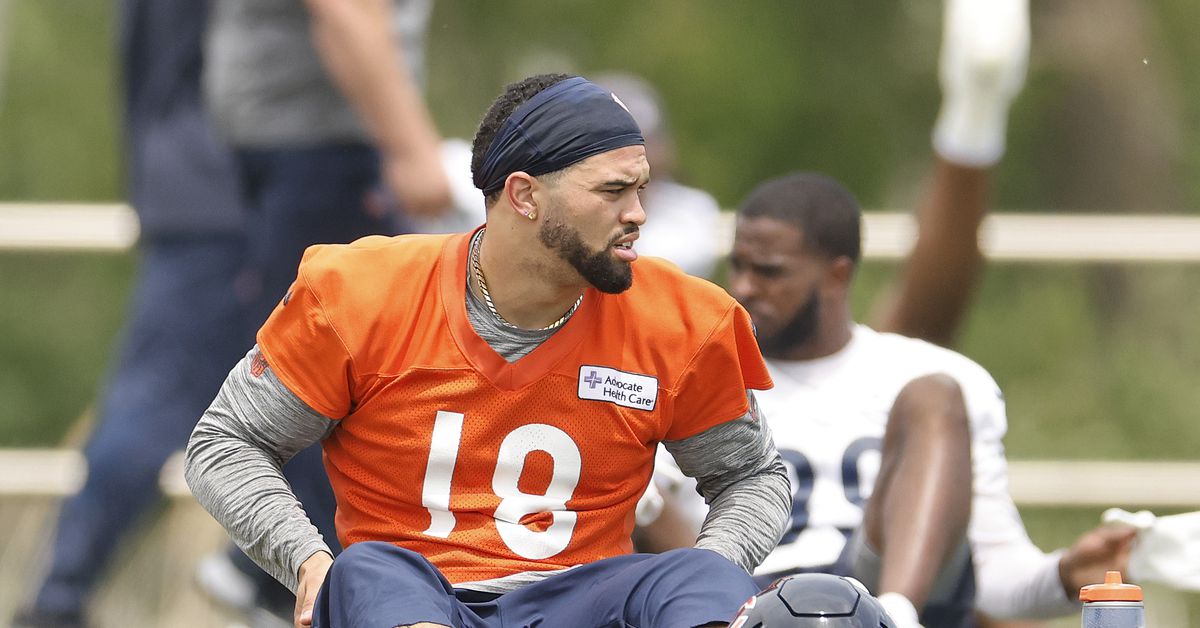 Chicago Bears Caleb Williams gives a fan a tattoo