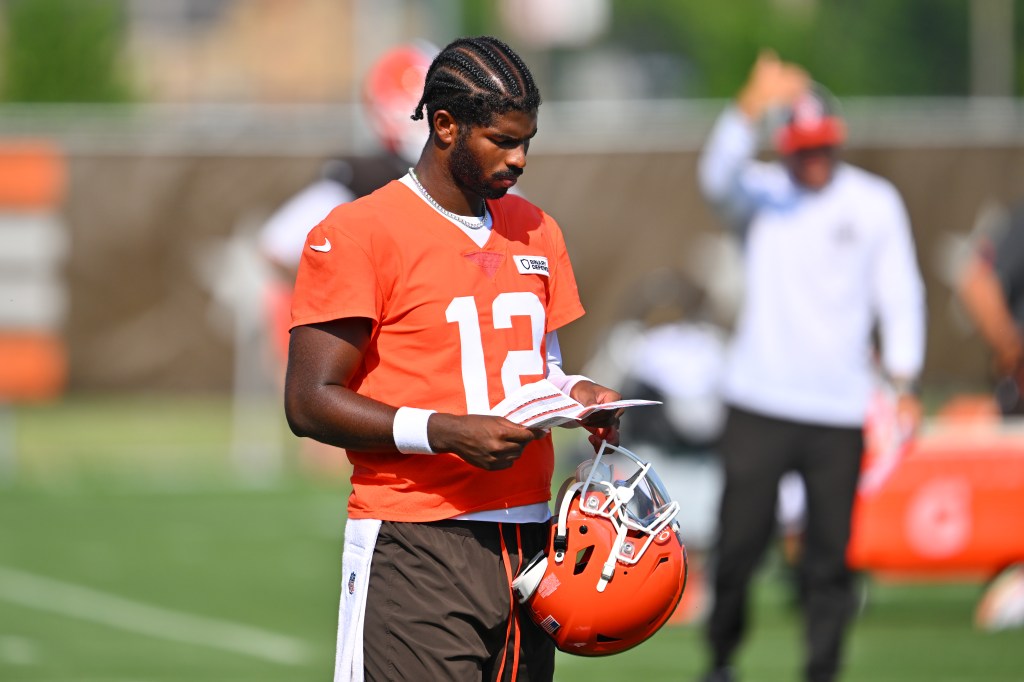 Quarterback Shedeur Sanders #12 of the Cleveland Browns reviews plays during training camp at CrossCountry Mortgage Campus on July 26, 2025 in Berea, Ohio. 
