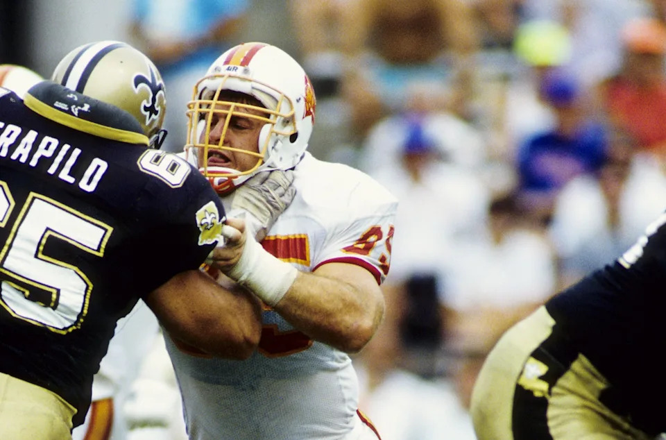 Sep 24, 1989; Tampa, FL, USA; FILE PHOTO; Tampa Bay Buccaneers nose tackle Curt Jarvis (95) in action against New Orleans Saints offensive guard Steve Trapilo (65) at Tampa Stadium during the 1989 season. Mandatory Credit: RVR Photots-USA TODAY Sports