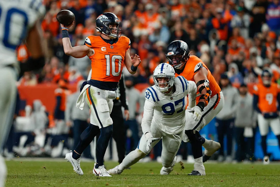 Denver Broncos quarterback Bo Nix (10) throws for a touchdown against Indianapolis Colts defensive end Laiatu Latu (97) as offensive tackle Garett Bolles.Isaiah J. Downing-Imagn Images