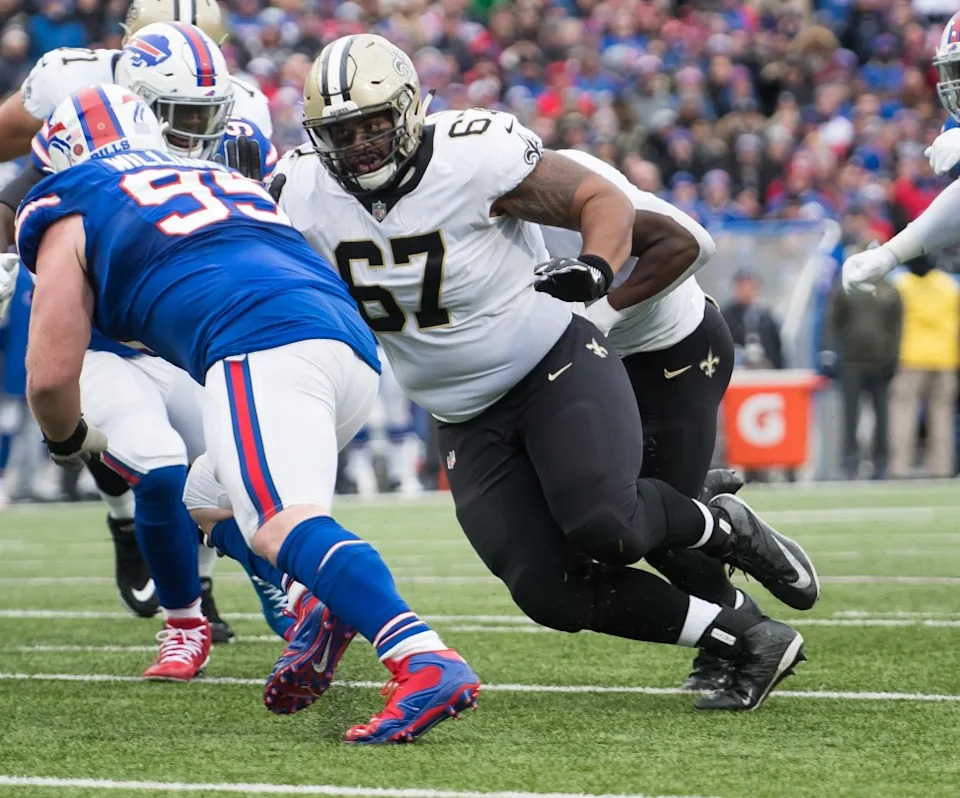 Nov 12, 2017; New Orleans Saints offensive guard Larry Warford (67) blocks Buffalo Bills defensive tackle Kyle Williams (95). Mandatory Credit: Mark Konezny-Imagn Images