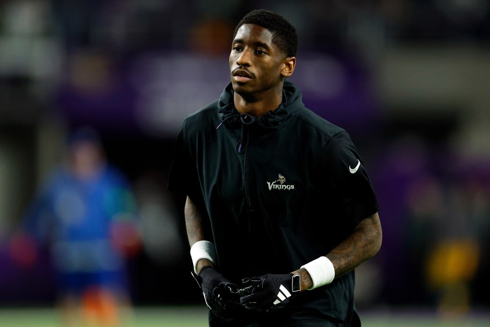 Minnesota Vikings player Jordan Addison warming up before a game.