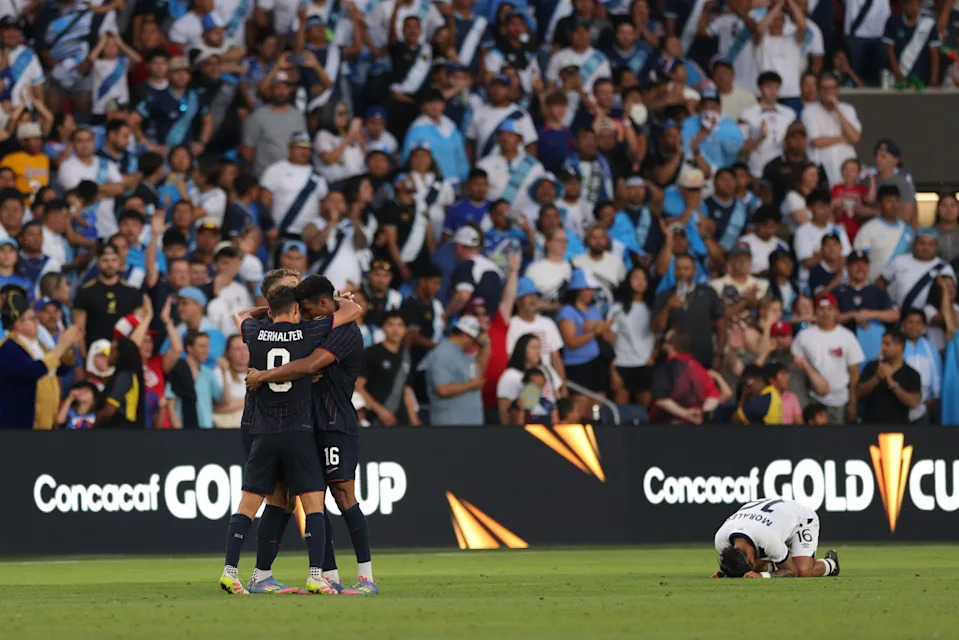ST LOUIS, MISSOURI - JULY 02: Sebastian Berhalter #8 and Alex Freeman #16 of United States celebrate as José Morales #16 of Guatemala reacts at the conclusion of the Gold Cup 2025 Semifinals at Energizer Park on July 02, 2025 in St Louis, Missouri. (Photo by John Dorton/ISI Photos/USSF/Getty Images)