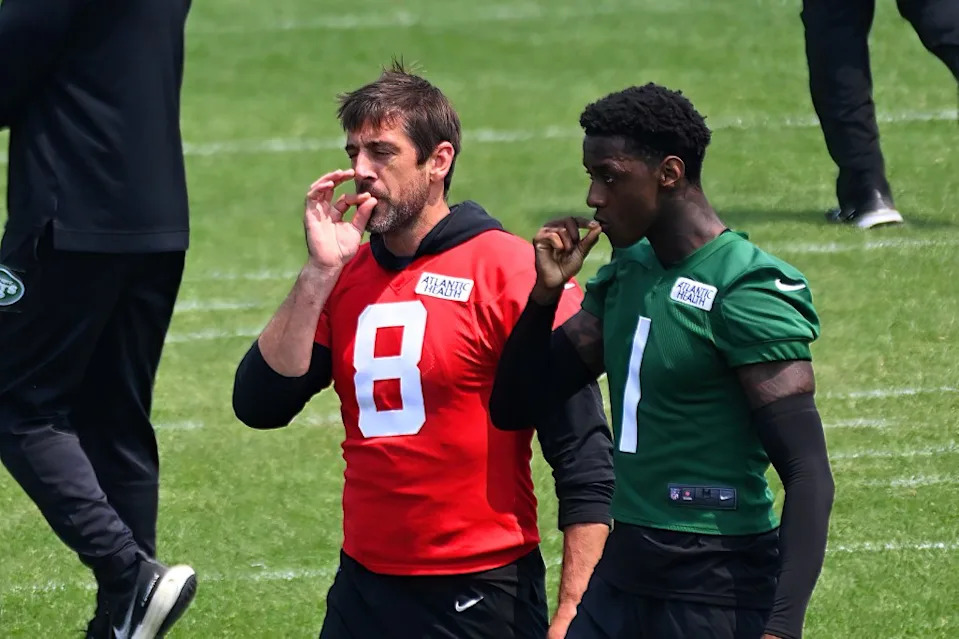 Aaron Rodgers and Sauce Gardner gesture during practice at OTAs in Florham Park, NJ on June 6, 2023. Bill Kostroun/New York Post