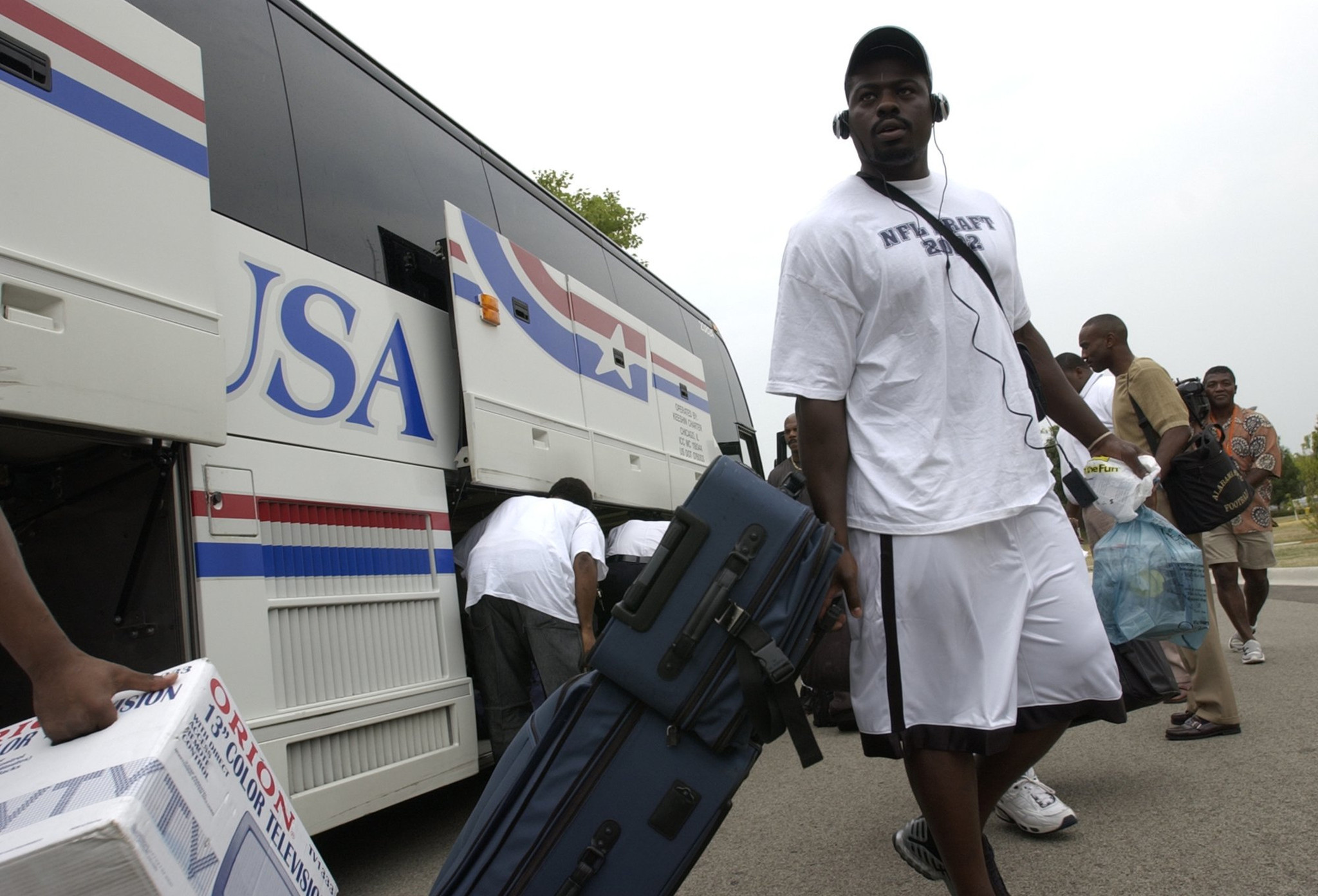 Alex Brown takes a look around after arriving by bus from Halas Hall in Bourbonnais in 2002.