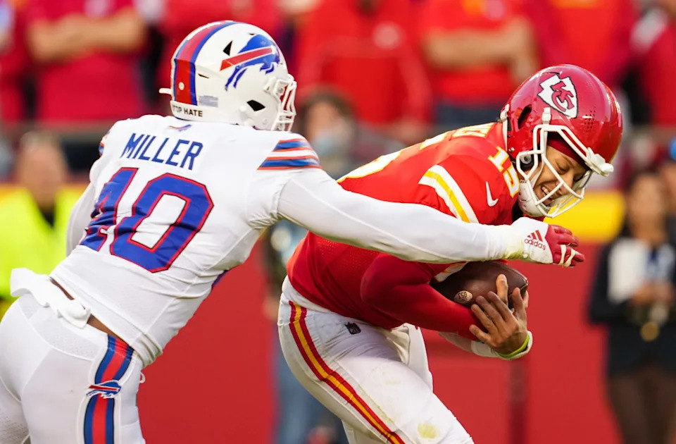 Oct 16, 2022; Kansas City, Missouri, USA; Kansas City Chiefs quarterback Patrick Mahomes (15) is sacked by Buffalo Bills linebacker Von Miller (40) during the second half at GEHA Field at Arrowhead Stadium. © Jay Biggerstaff-Imagn Images