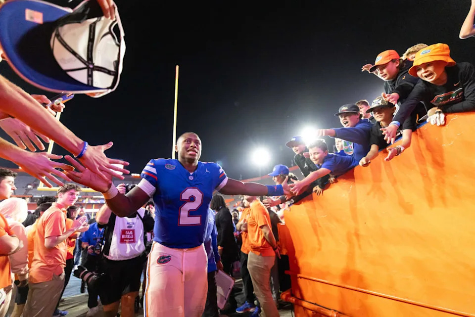 Florida Gators quarterback DJ Lagway (2) shakes hands while entering the locker room.Matt Pendleton-Imagn Images