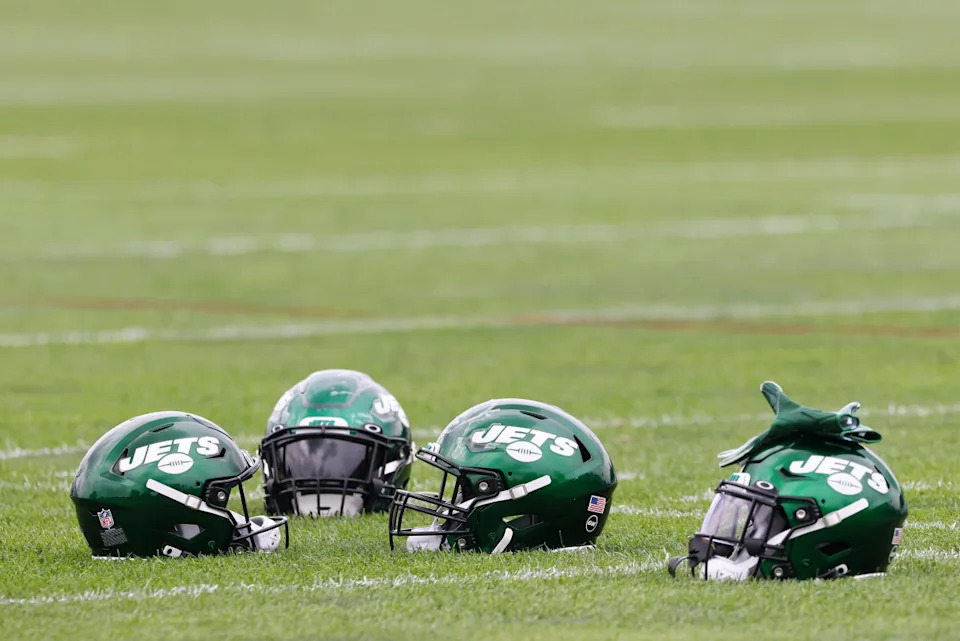 FLORHAM PARK, NJ - JULY 29: New York Jets football helmets sit on the ground during a morning practice at Atlantic Health Jets Training Center on July 29, 2021 in Florham Park, New Jersey. (Photo by Rich Schultz/Getty Images)Rich Schultz/Getty Images
