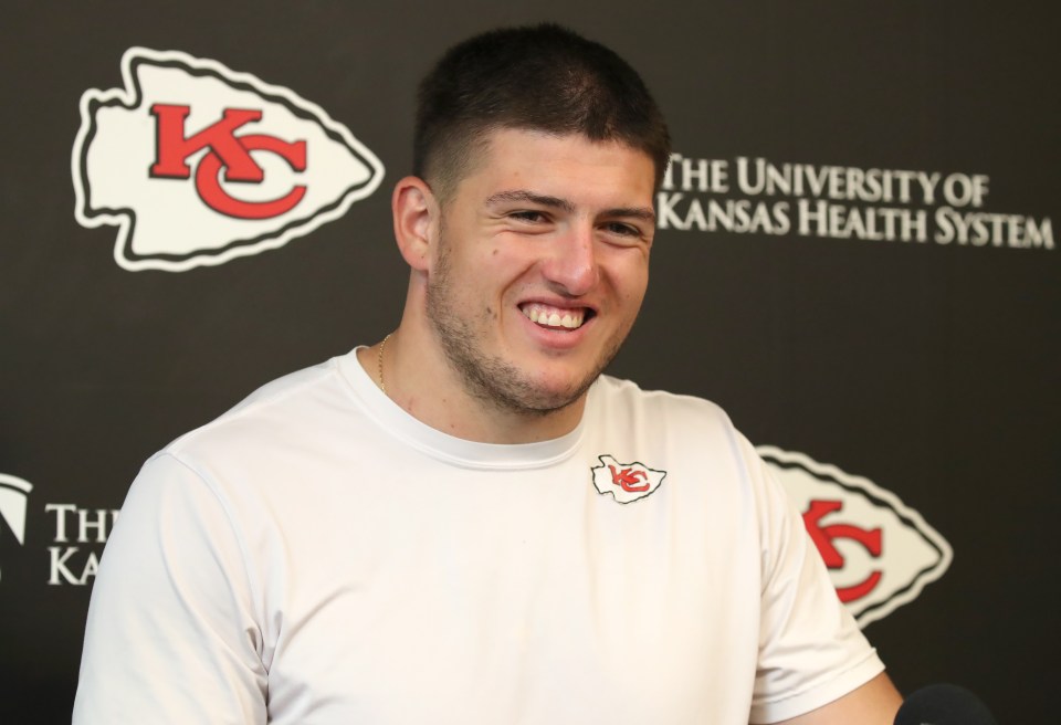 Kansas City Chiefs defensive end George Karlaftis #56 at a press conference.