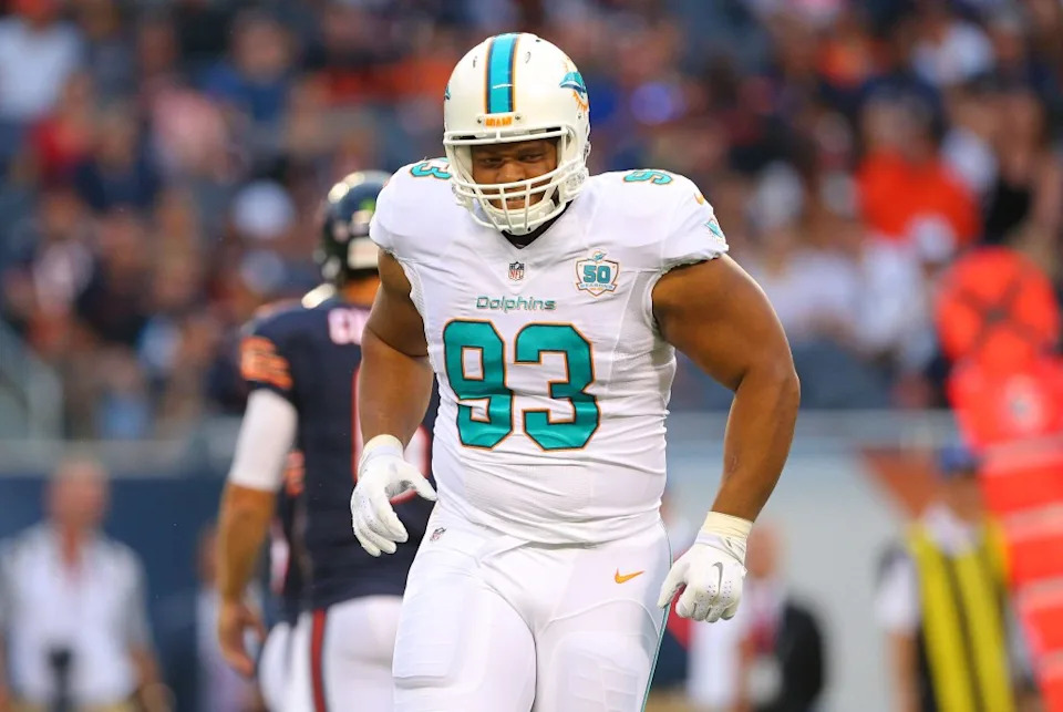 Miami Dolphins defensive tackle Ndamukong Suh (93) reacts to a play during the first quarter of a preseason NFL football game against the Chicago Bears at Soldier Field. USA Today Sports