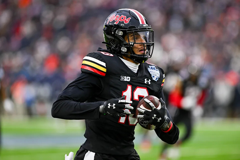NASHVILLE, TENNESSEE - DECEMBER 30: Glendon Miller #13 of the Maryland Terrapins intercepts the ball against the Auburn Tigers in the second half of the TransPerfect Music City Bow at Nissan Stadium on December 30, 2023 in Nashville, Tennessee. (Photo by Carly Mackler/Getty Images)