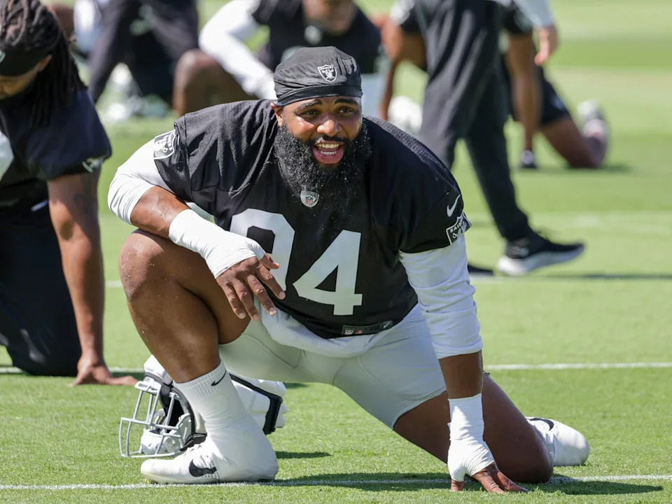 Las Vegas Raiders star Christian Wilkins has been released from the team after being reported to HR after kissing the top of a teammate’s head (Getty Images)