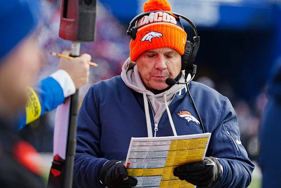 Denver Broncos head coach Sean Payton looks over the play sheet during the first half of the Buffalo Bills wild card game against the Denver Broncos.Tina MacIntyre-Yee/Democrat and Chronicle / USA TODAY NETWORK via Imagn Images
