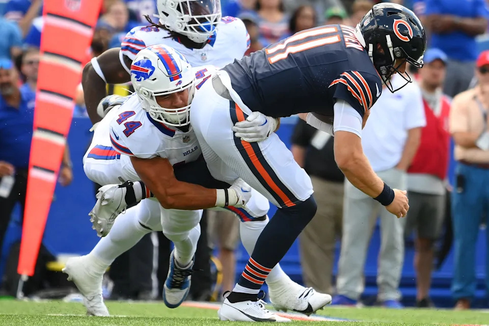 ORCHARD PARK, NEW YORK - AUGUST 10: Joe Andreessen #44 of the Buffalo Bills attempts to tackle Brett Rypien #11 of the Chicago Bears during the second half of a preseason game at Highmark Stadium on August 10, 2024 in Orchard Park, New York. The Bears won 33-6. (Photo by Rich Barnes/Getty Images)