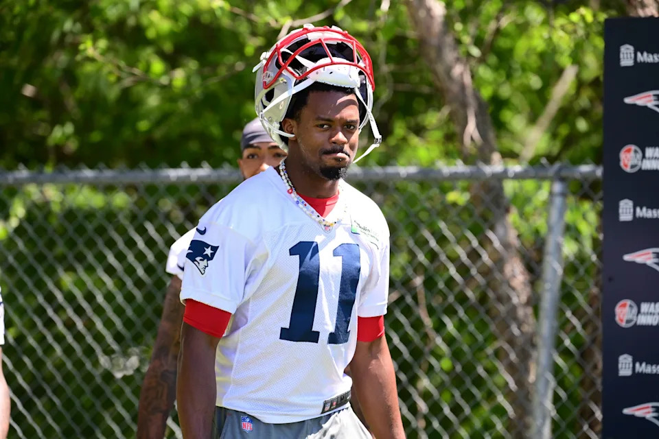 Jun 10, 2024; Foxborough, MA, USA; New England Patriots wide receiver Tyquan Thornton (11) walks to the practice fields for minicamp at Gillette Stadium. Mandatory Credit: Eric Canha-USA TODAY Sports