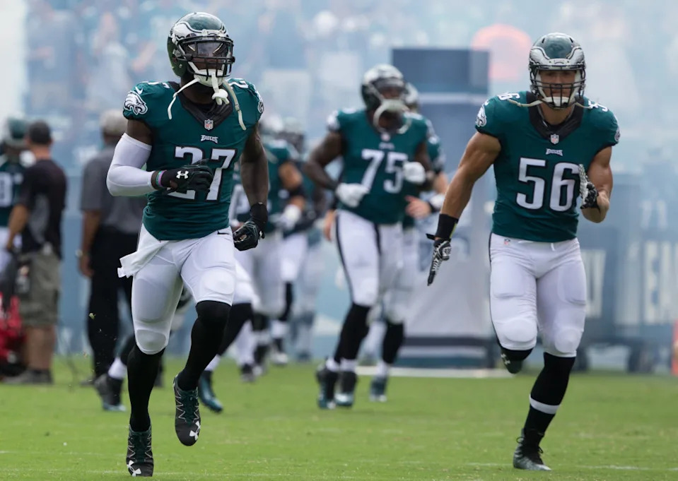 Former Philadelphia Eagles free safety Malcolm Jenkins and defensive end Bryan BramanBill Streicher-Imagn Images