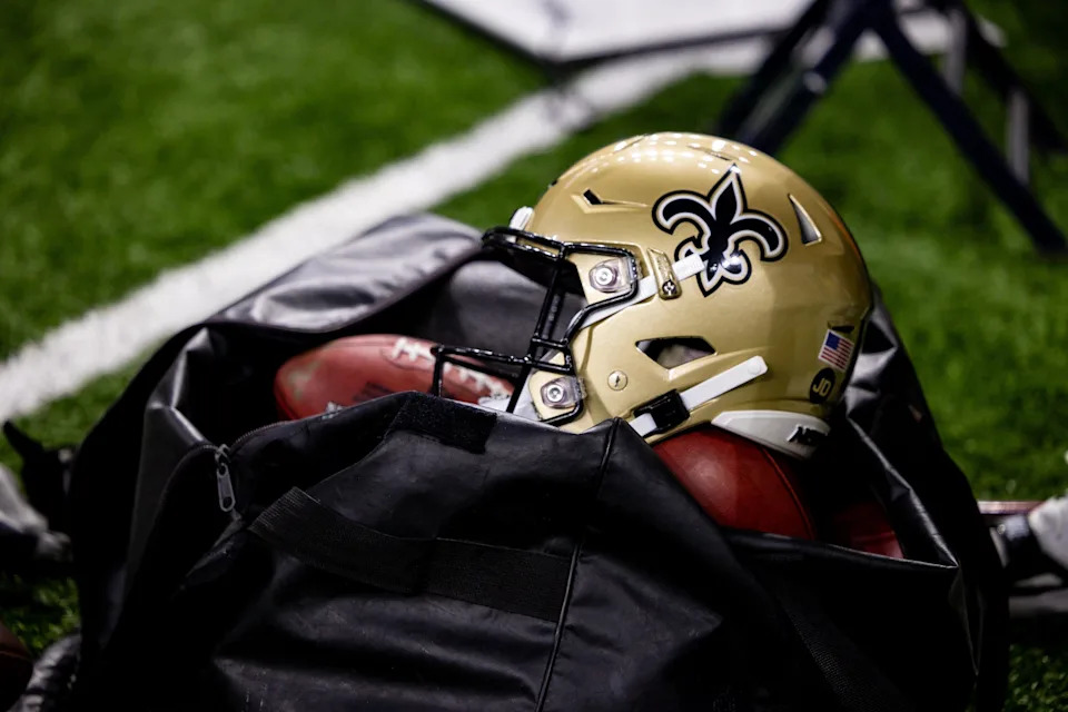 Nov 5, 2023; New Orleans, Louisiana, USA; Detailed view of the New Orleans Saints helmet and ball bag against the Chicago Bears during the first half at the Caesars Superdome. Mandatory Credit: Stephen Lew-USA TODAY Sports