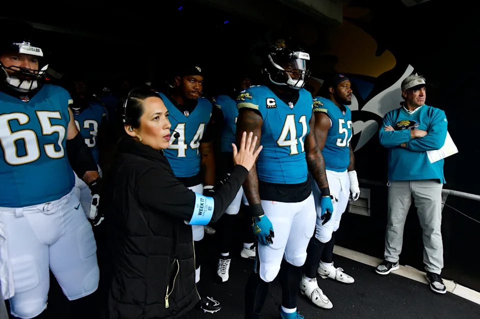 From left, Jacksonville Jaguars center Mitch Morse (65), defensive end Travon Walker (44), defensive end Josh Hines-Allen (41), defensive tackle DaVon Hamilton (52) and Jacksonville Jaguars head coach Doug Pederson wait to run on the field before an NFL football matchup Sunday, Dec. 15, 2024 at EverBank Stadium in Jacksonville, Fla. [Corey Perrine/Florida Times-Union]