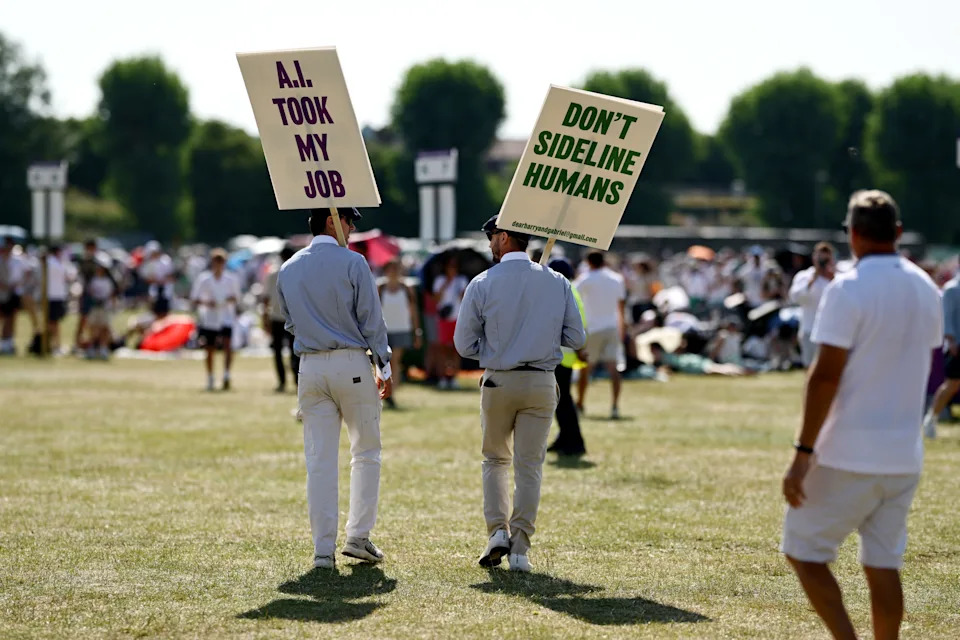 Fans dressed as line judges protesting the use of ELC at Wimbledon. (Hannah Peters/Getty Images)