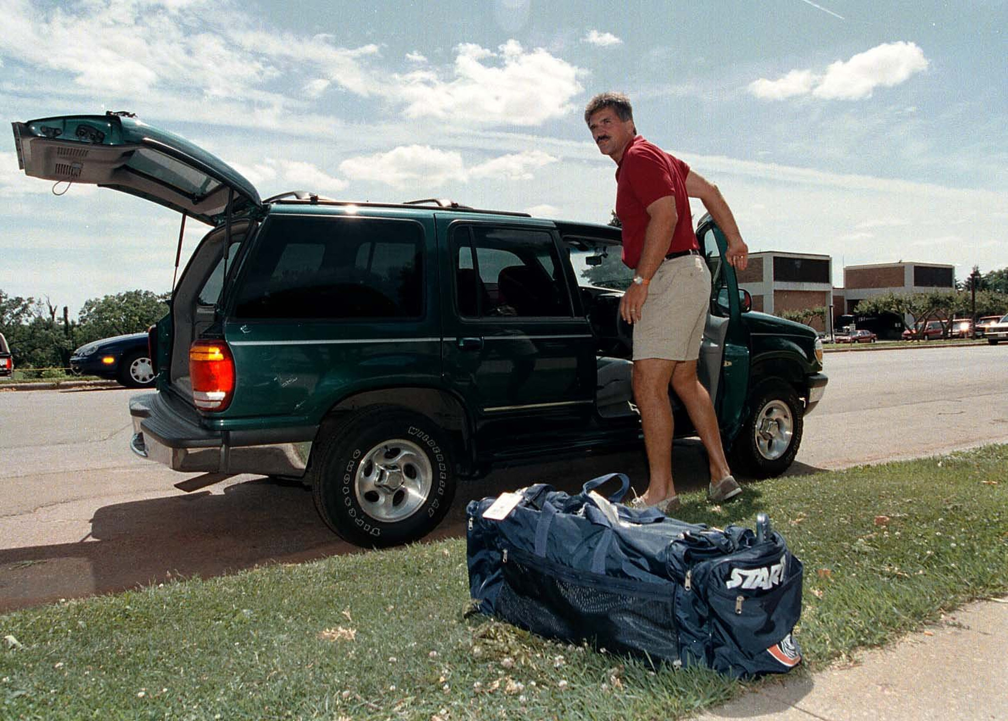 Bears head coach Dave Wannstedt is surprised with the media turnout in Platteville, Wis., in 1998. consin.