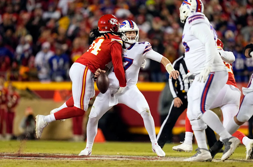 Buffalo Bills quarterback Josh Allen (17) drops back to pass under pressure from Kansas City Chiefs linebacker Melvin Ingram (24).(Jay Biggerstaff-Imagn Images)