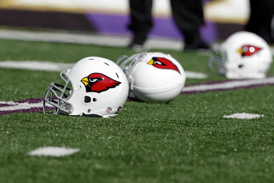 BALTIMORE, MD - OCTOBER 30: Helmets belonging to the Arizona Cardinals sit on the turf before the start of the Cardinals game against the Baltimore Ravens at M&T Bank Stadium on October 30, 2011 in Baltimore, Maryland. (Photo by Rob Carr/Getty Images)Rob Carr/Getty Images