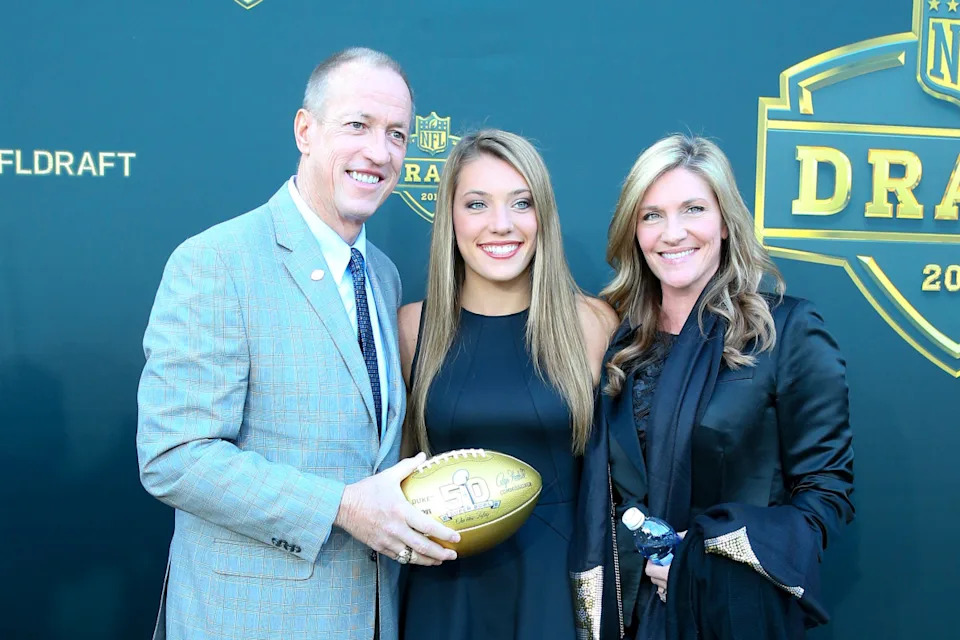30 APR 2015: NFL Hall of Famer and Buffalo Bill Quarterback Jim Kelly and his wife Jill and daughter Erin carries a Gold Football on the Gold Carpet at the 2015 National Football League Draft. The 2015 National Football League Draft was held at the Auditorium Theatre in Chicago IL. (Photo by Rich Graessle/Icon Sportswire/Corbis/Icon Sportswire via Getty Images)Icon Sports Wire/Getty Images