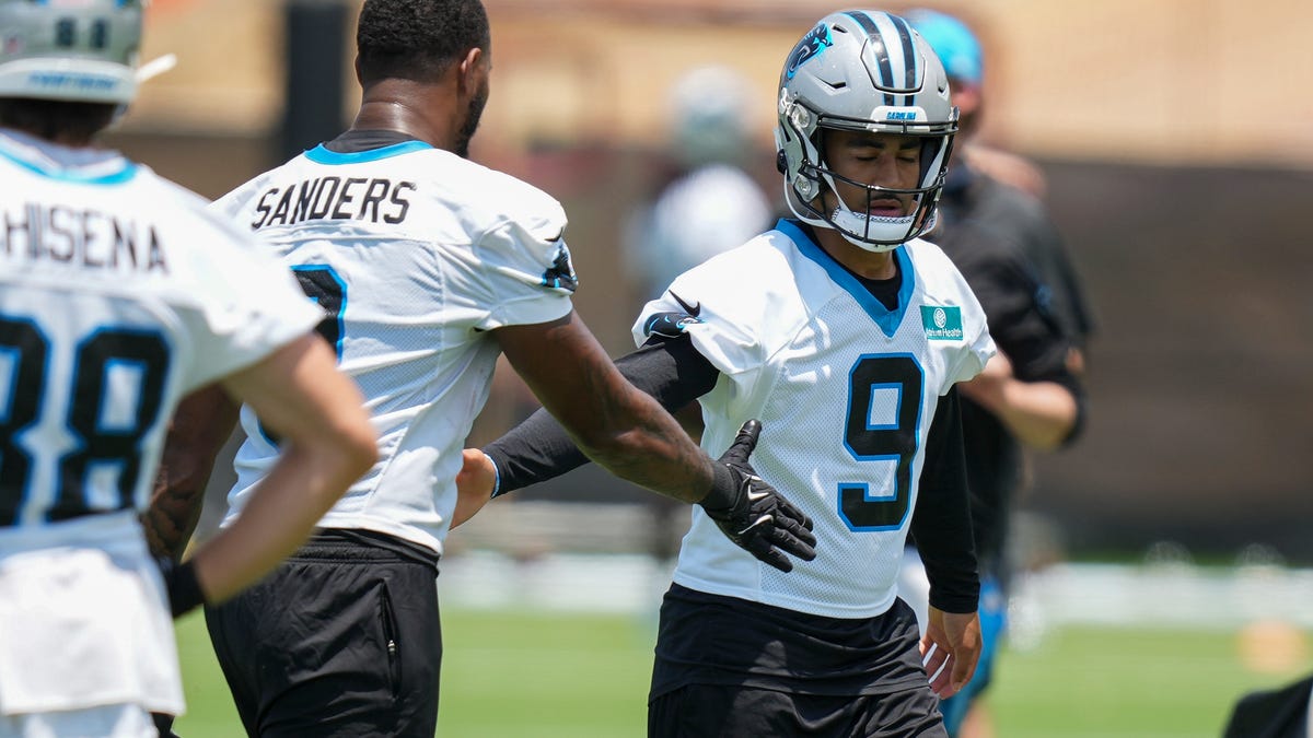 Bryce Young throws dimes to Panthers WRs during training session