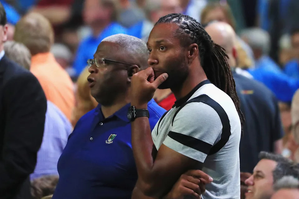 GLENDALE, AZ - APRIL 01: NFL player Larry Fitzgerald of the Arizona Cardinals (R) and Larry Fitzgerald Sr. attend the game between the North Carolina Tar Heels and the Oregon Ducks during the 2017 NCAA Men's Final Four Semifinal at University of Phoenix Stadium on April 1, 2017 in Glendale, Arizona. (Photo by Ronald Martinez/Getty Images)Ronald Martinez/Getty Images