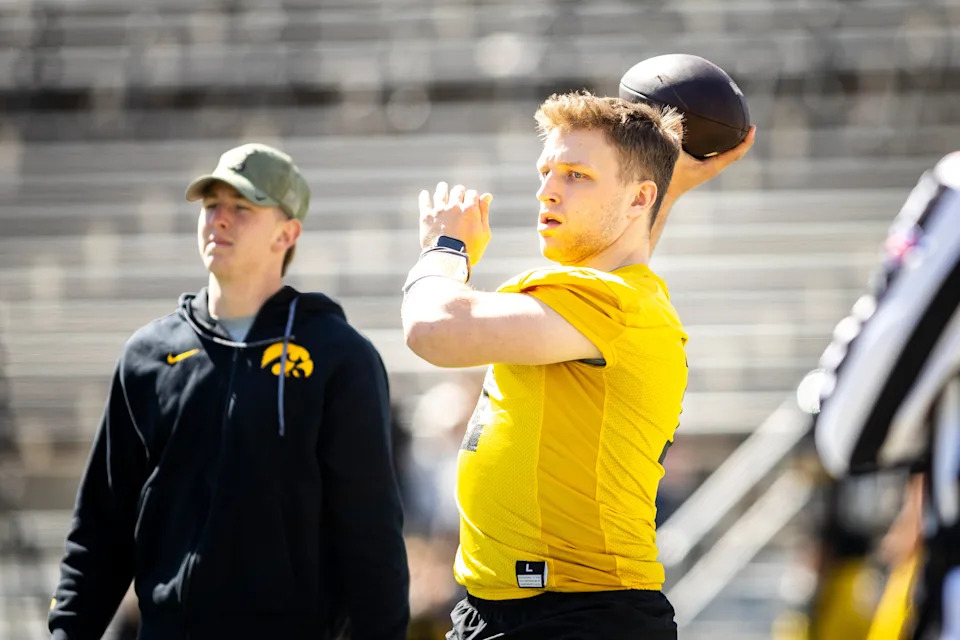Apr 26, 2025; Iowa City, IA, USA; Iowa quarterback Mark Gronowski (11) throws during a spring NCAA football open practice at Kinnick Stadium. Mandatory Credit: Joseph Cress-The Des Moines Register