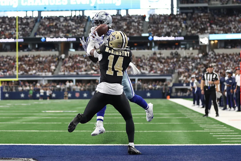 Sep 15, 2024; Arlington, Texas, USA; Dallas Cowboys wide receiver CeeDee Lamb (88) cannot catch a pass while defended by New Orleans Saints cornerback Kool-Aid McKinstry (14) at AT&T Stadium. Mandatory Credit: Tim Heitman-Imagn ImagesTim Heitman-Imagn Images