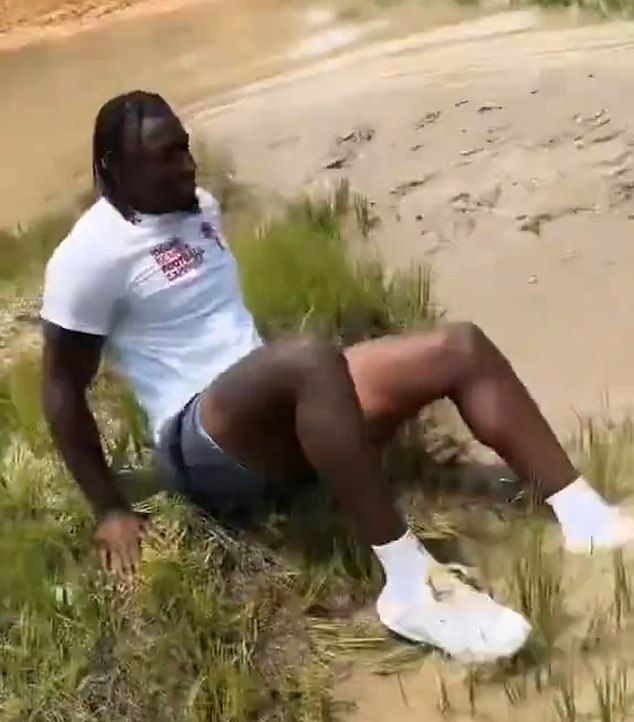 Xavier Legette got dirty while trying to help out a friend who was stuck in the mud