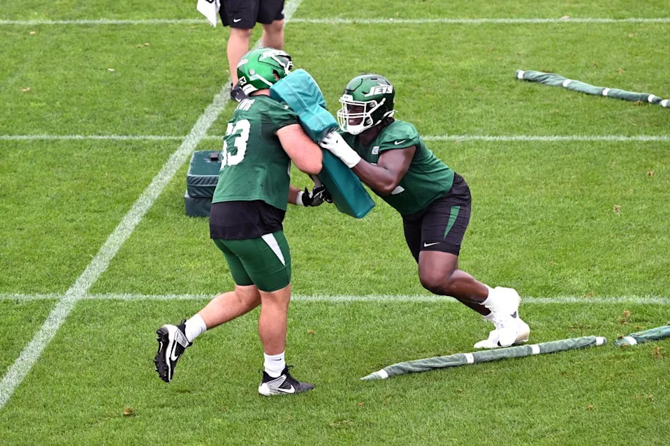 Jets offensive tackle Olu Fashanu (74) and center Gus Hartwig (63) practice during minicamp in Florham Park, NJ. Bill Kostroun/New York Post