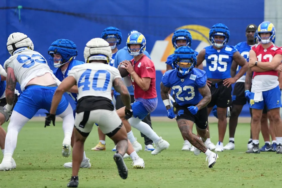 Jun 3, 2025; Woodland Hills, CA, USA; Los Angeles Rams quarterback Matthew Stafford (9) throws the ball during organized team activities at Rams Practice Facility. Credit: Kirby Lee-Imagn Images