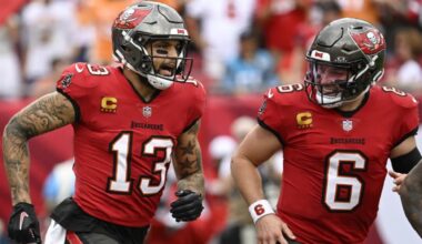 Tampa Bay Buccaneers wide receiver Mike Evans (13) celebrates after catching a touchdown pass against the Washington Commanders during the first half of an NFL wild-card playoff football game in Tampa, Fla., Sunday, Jan. 12, 2025. (AP Photo/Jason Behnken)