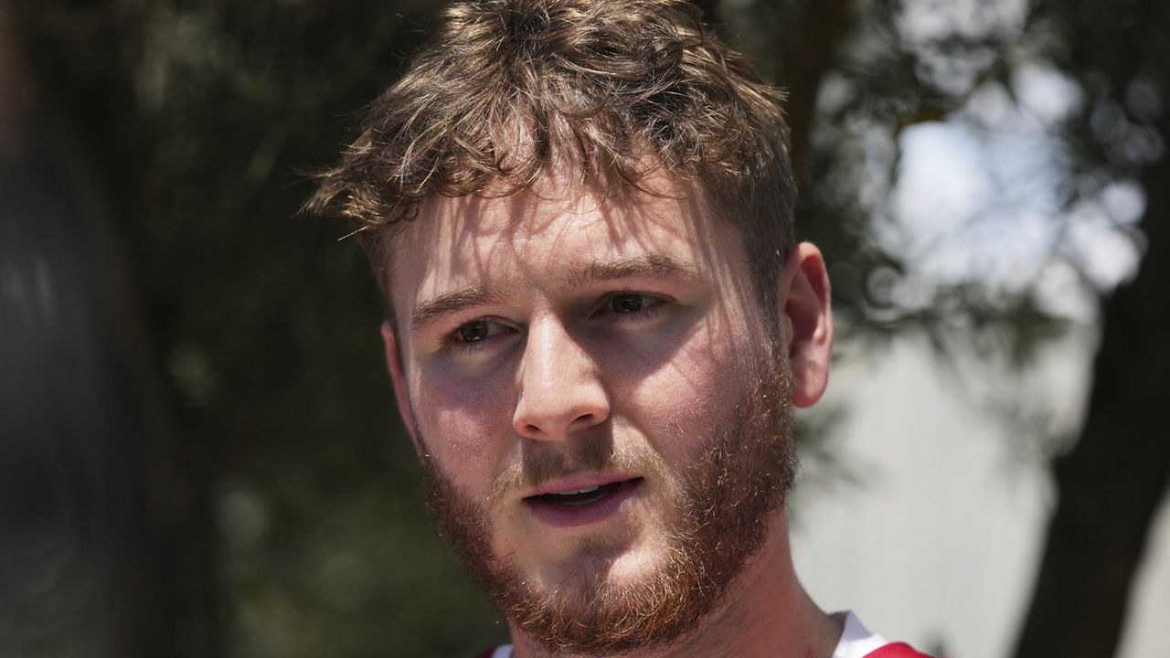 Miami Dolphins quarterback Quinn Ewers is interviewed during the NFL football team's rookie minicamp Friday, May 9, 2025, in Miami Gardens, Fla. (AP Photo/Lynne Sladky)