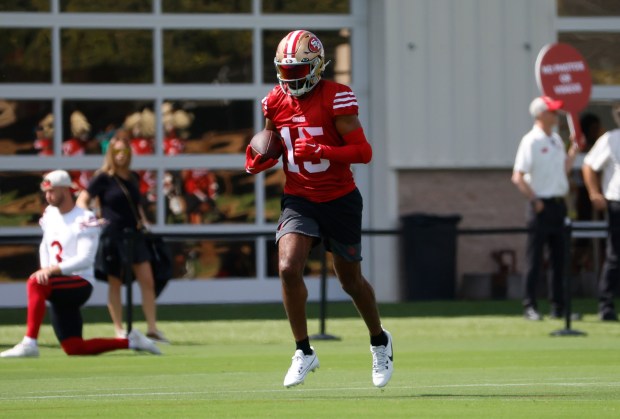 San Francisco 49ers' Jauan Jennings (15) runs with the ball during practice at the 49ers training camp at the practice facility at Levi's Stadium in Santa Clara, Calif., on Wednesday, July 23, 2025. (Nhat V. Meyer/Bay Area News Group)