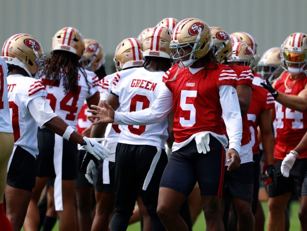 San Francisco 49ers' Demarcus Robinson (5) high-fives teammates during practice at the 49ers training camp at the practice facility at Levi's Stadium in Santa Clara, Calif., on Wednesday, July 23, 2025. (Nhat V. Meyer/Bay Area News Group)