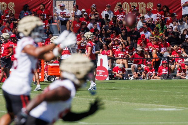 San Francisco 49ers fans watch a training camp practice at the practice facility at Levi's Stadium in Santa Clara, Calif., on Friday, July 26, 2024. (Dai Sugano/Bay Area News Group)