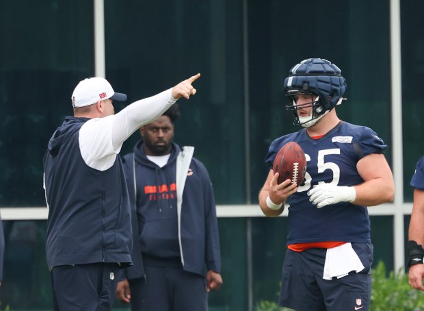 Offensive lineman Luke Newman (65) listens to directions during Bears minicamp at Halas Hall on June 4, 2025, in Lake Forest. (Stacey Wescott/Chicago Tribune)